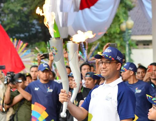 Tips Atasi Badan Lemas Saat Ikut Kirab Obor Asian Games