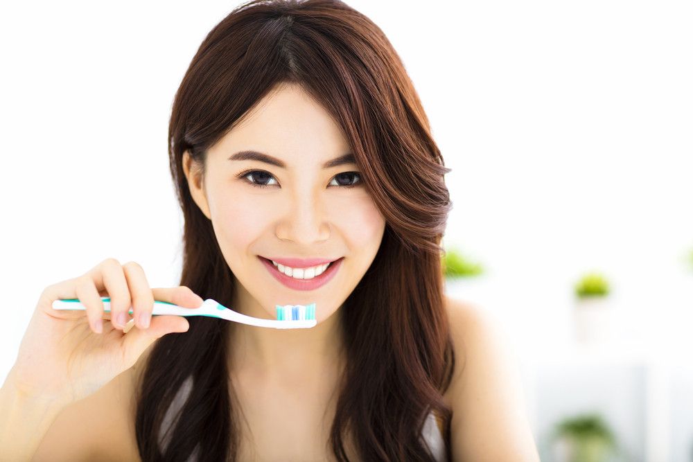 Tips Jaga Kesehatan Gigi Usai Konsumsi Makanan Manis Saat Imlek
