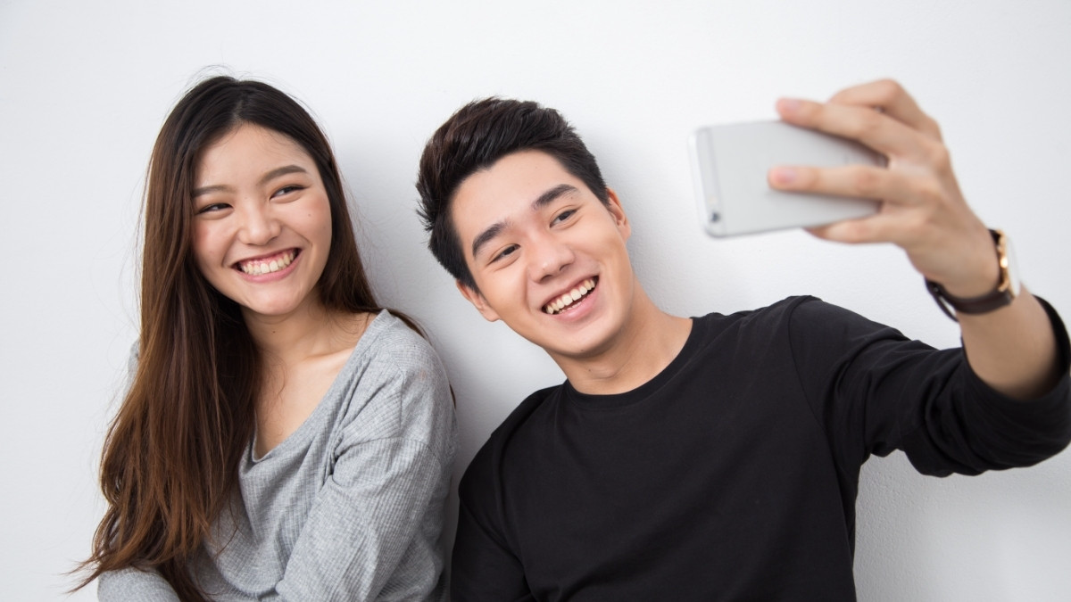 Posting Foto Pacar di Media Sosial Bisa Tingkatkan Kualitas Hubungan?