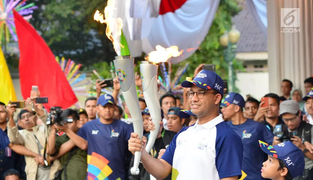 Tips Atasi Badan Lemas Saat Ikut Kirab Obor Asian Games
